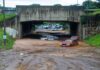 TV Reporter Dives In – Rescues Drowning Man Flooded underpass with stranded cars in muddy water
