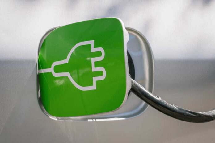 Charging,The,Electric,Car,In,Station.,Renewable,Energy,In,Transportation