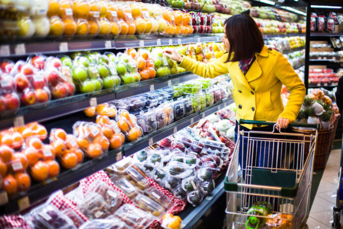 Young,Woman,Shopping,In,The,Supermarket