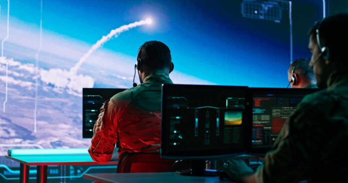 Zoom,In,View,Of,Military,Men,Using,Computers,To,Watch