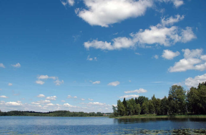 Summer,Landscape,With,Lake,And,Cloudskape,In,Sky